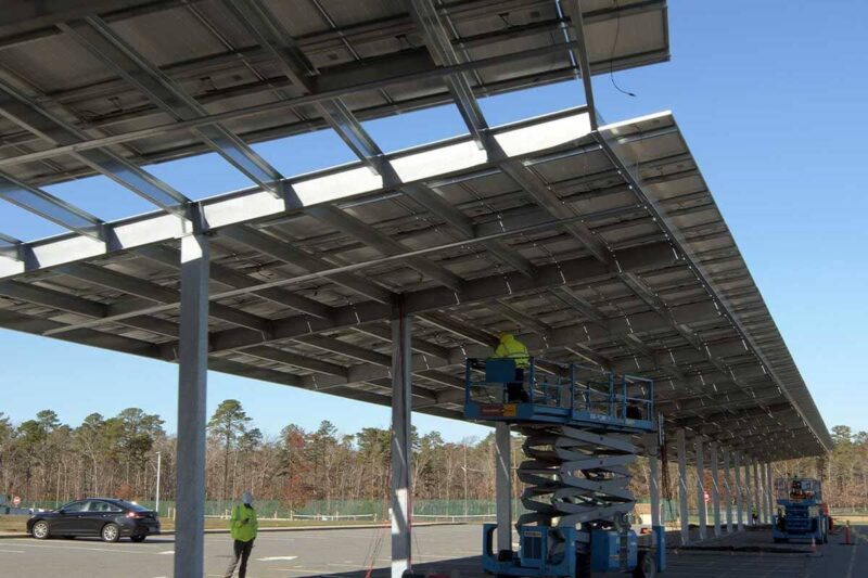 A solar carport installed at Cedar Creek High School in NJ. Community Solar in New Jersey NJ Community Solar Developer NJ Community Solar Installer New Jersey Community Solar Installer New Jersey Community Solar Developer Nj community solar installers Nj community solar installer New jersey community solar installers New jersey community solar installer New jersey community solar development Nj community solar development Nj community solar developers Nj community solar developer New jersey community solar developer New jersey community solar developers