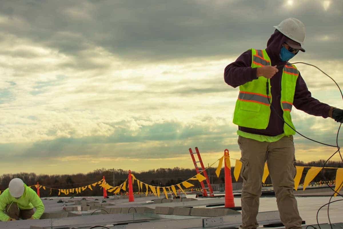 Grover Middle School Solar Rooftop In NJ Workers On Roof